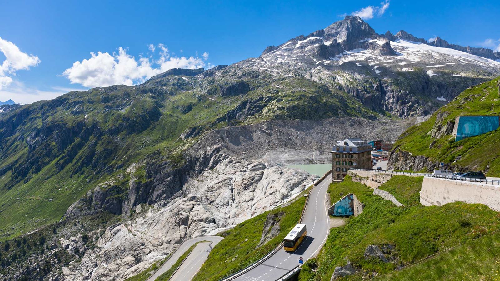 A Postbus travels over the Furka Pass.