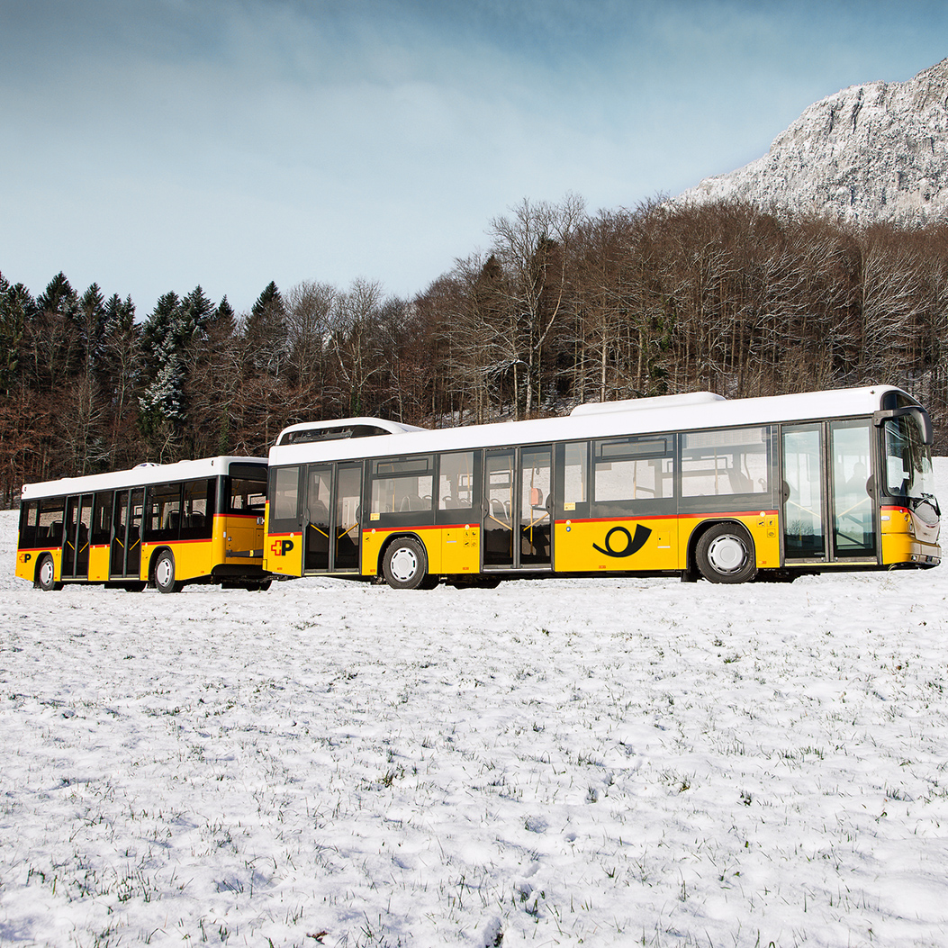Postbus with a trailer
